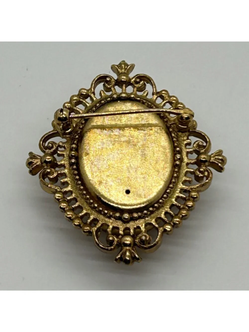 Avon this brooch